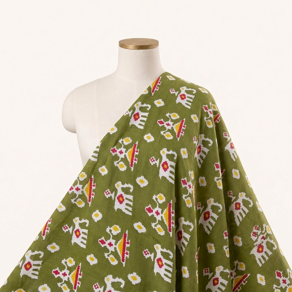 Green Patola Print Cotton Fabric Draped as a saree
