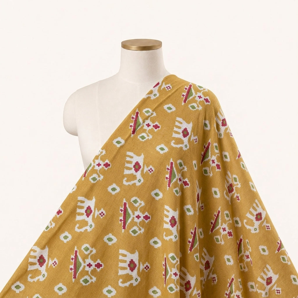Yellow Patola Print Cotton Fabric Draped as a saree