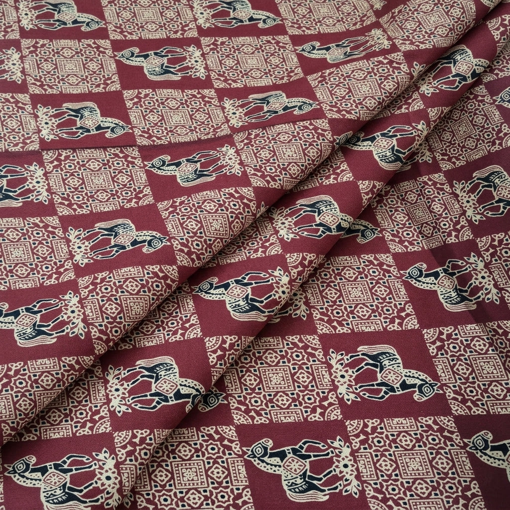 Folded Maroon Printed Cotton Fabric