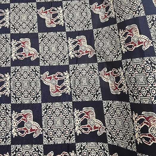 Black Printed Cotton Fabric, laid flat