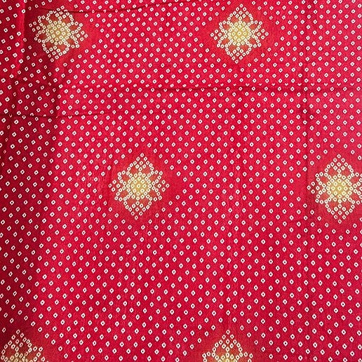 Maroon Printed Cotton Fabric, laid flat
