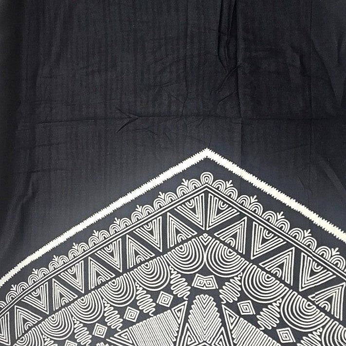 Black Printed Cotton Fabric, laid flat