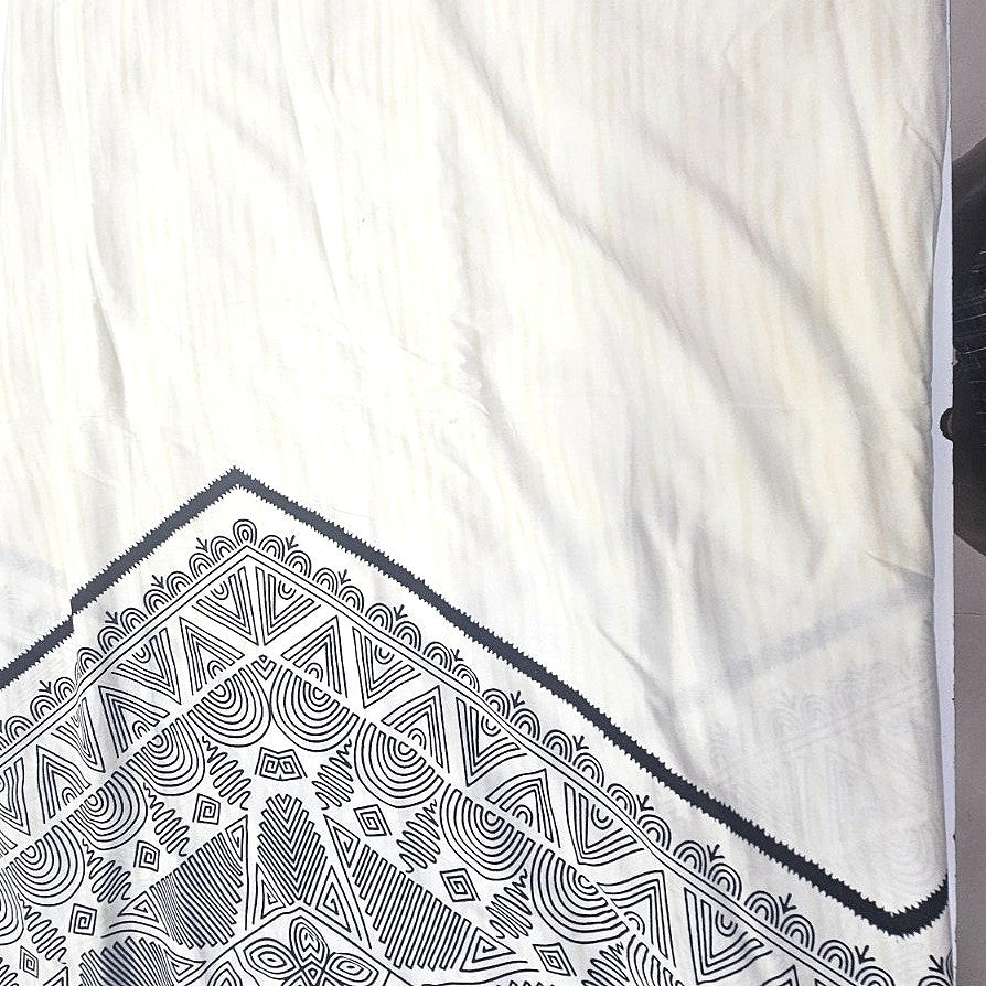 Cream Printed Cotton Fabric, laid flat