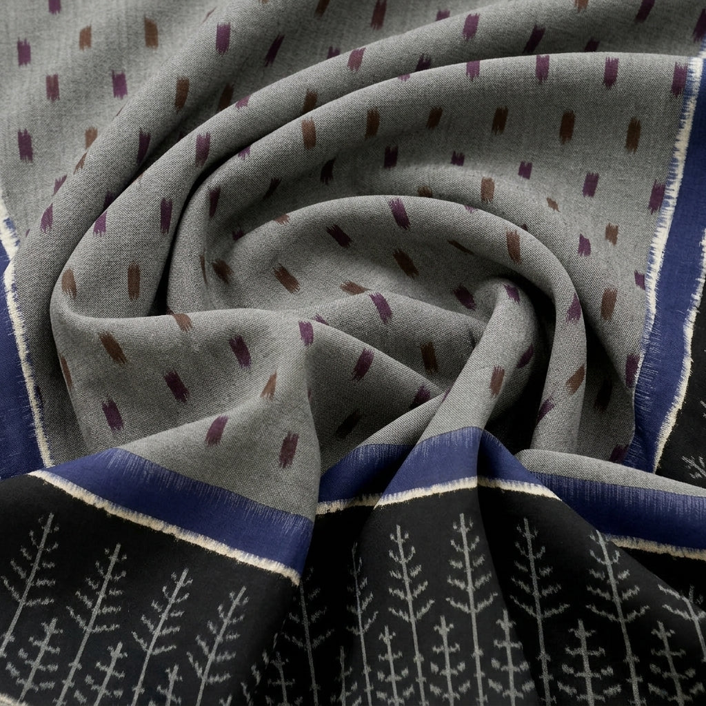 Swirled Grey Ikat Cotton Fabric Showing Border and Drape