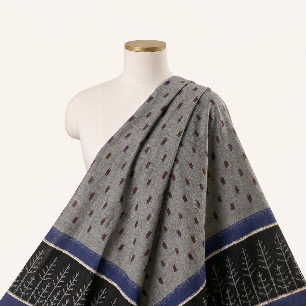 Grey Ikat Cotton Fabric Draped as a saree