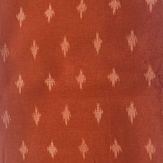 Rust Ikat Cotton Fabric, laid flat