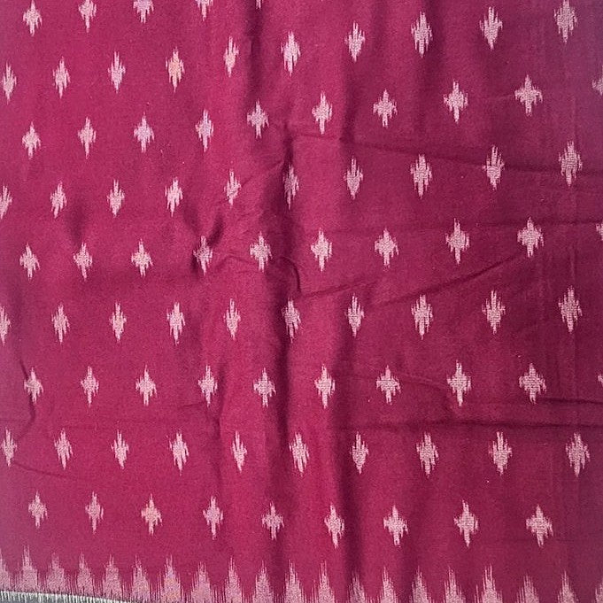 Wine Ikat Cotton Fabric, laid flat