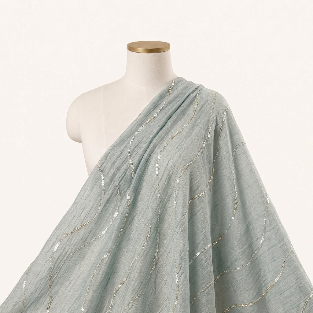 Green Embroidery Organza Fabric Draped as a saree