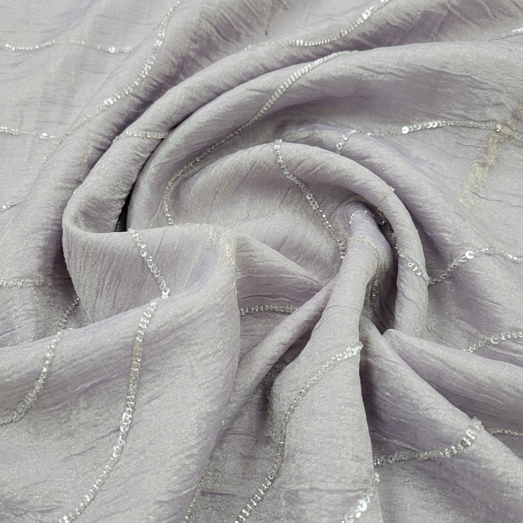 Swirled Purple Gold Embroidery Organza Fabric Showing Sequin Beads and Drape