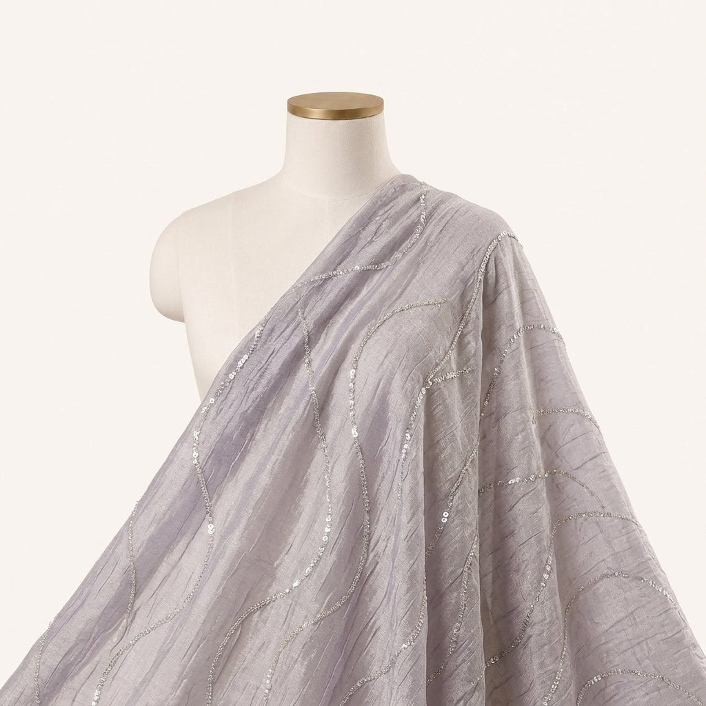 Purple Gold Embroidery Organza Fabric Draped as a saree
