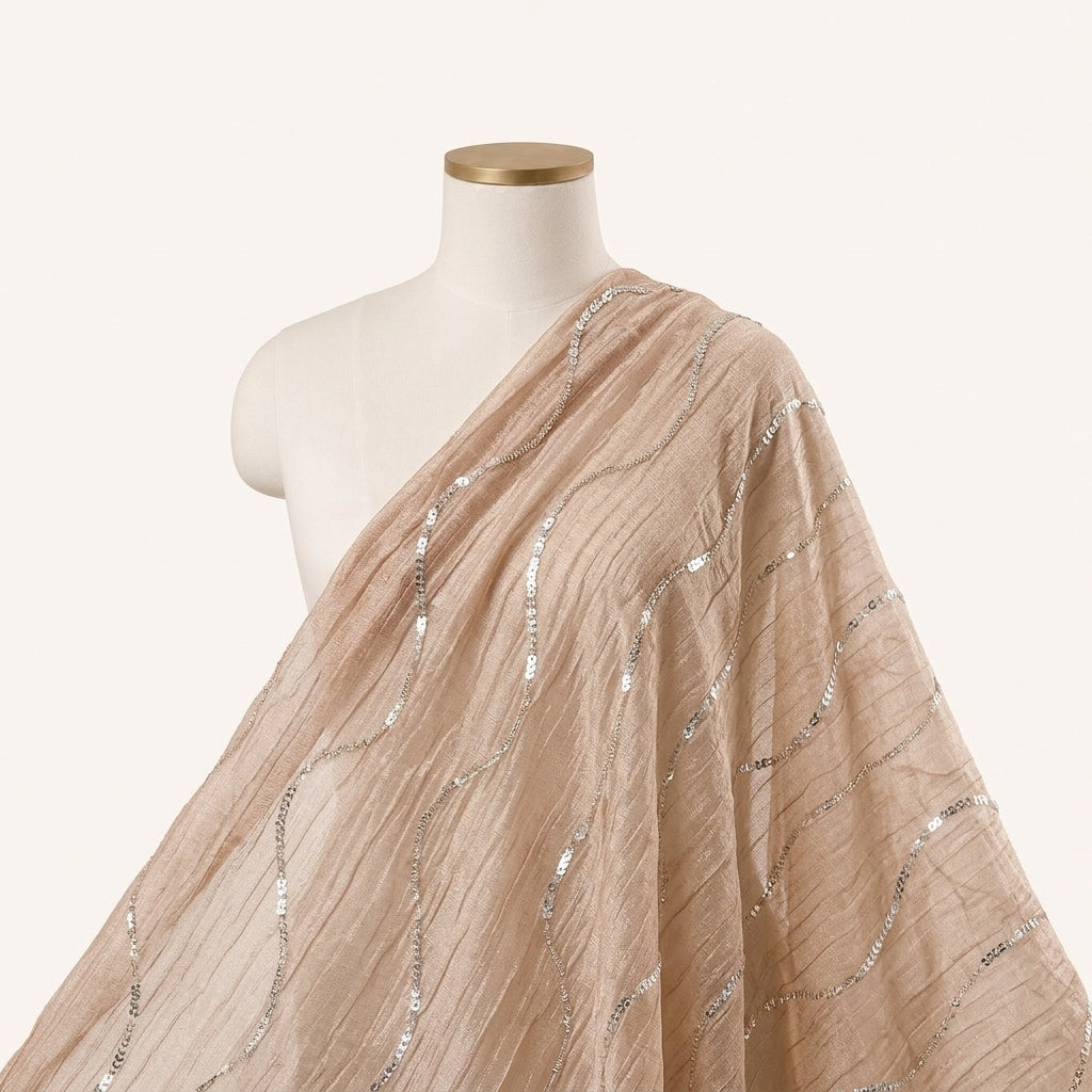 Peach Pink Embroidery Organza Fabric Draped as a saree