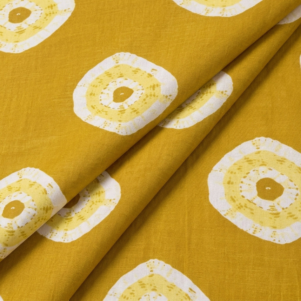 Folded Yellow Bandhini Cotton Fabric