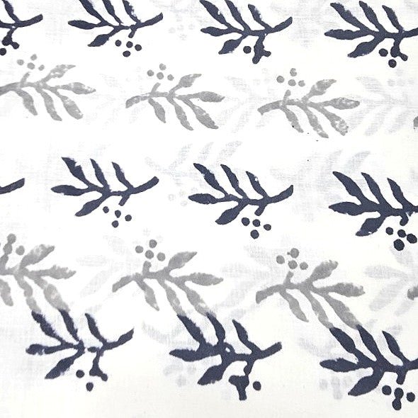 White Hand block Cotton Fabric, laid flat