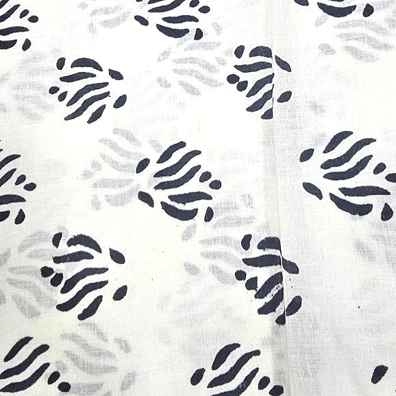 White Hand block Cotton Fabric, laid flat