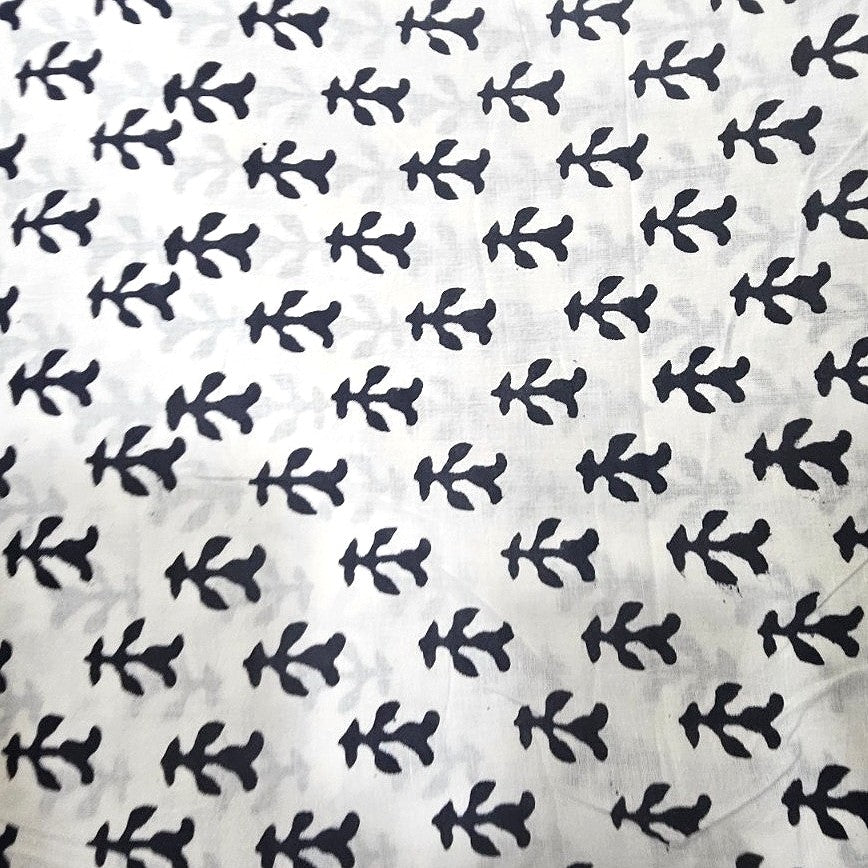 White Hand block Cotton Fabric, laid flat
