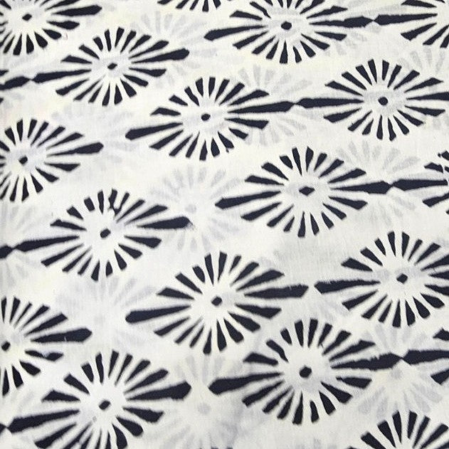 White Hand block Cotton Fabric, laid flat