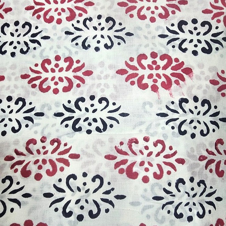 White Hand block Cotton Fabric, laid flat