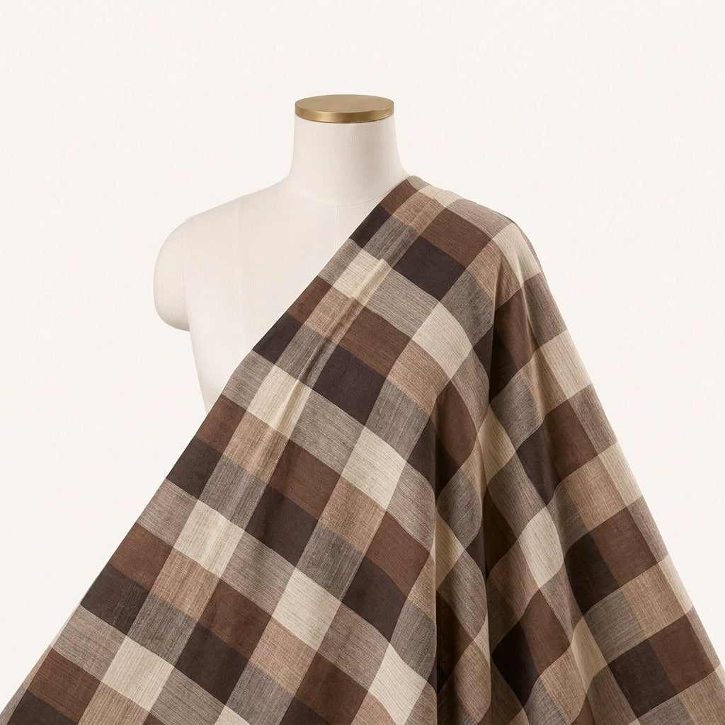 Brown Checked Raw Silk Fabric Draped as a saree