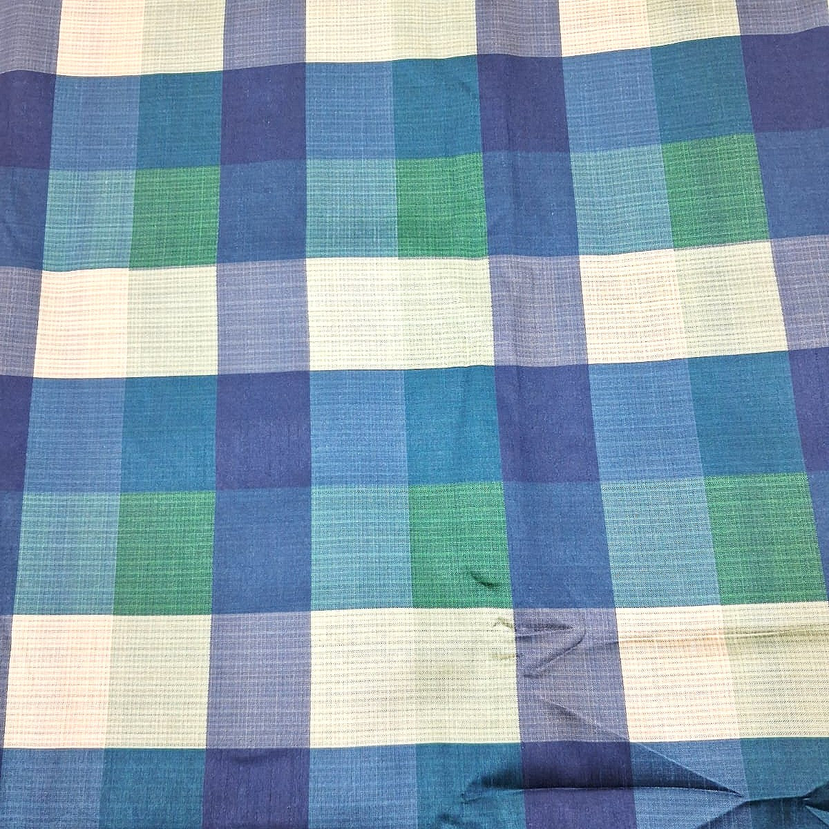 Blue Checked Raw Silk Fabric, laid flat