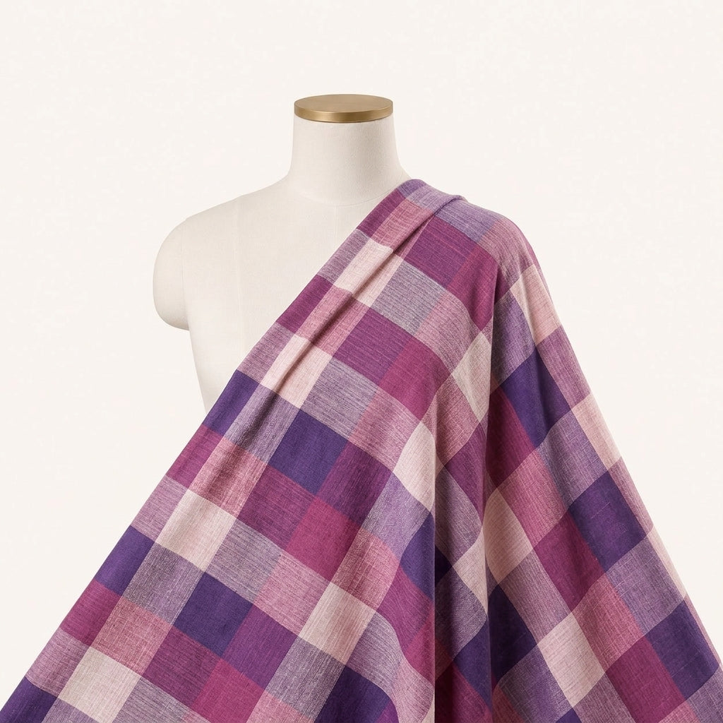 Violet Checked Raw Silk Fabric Draped as a saree