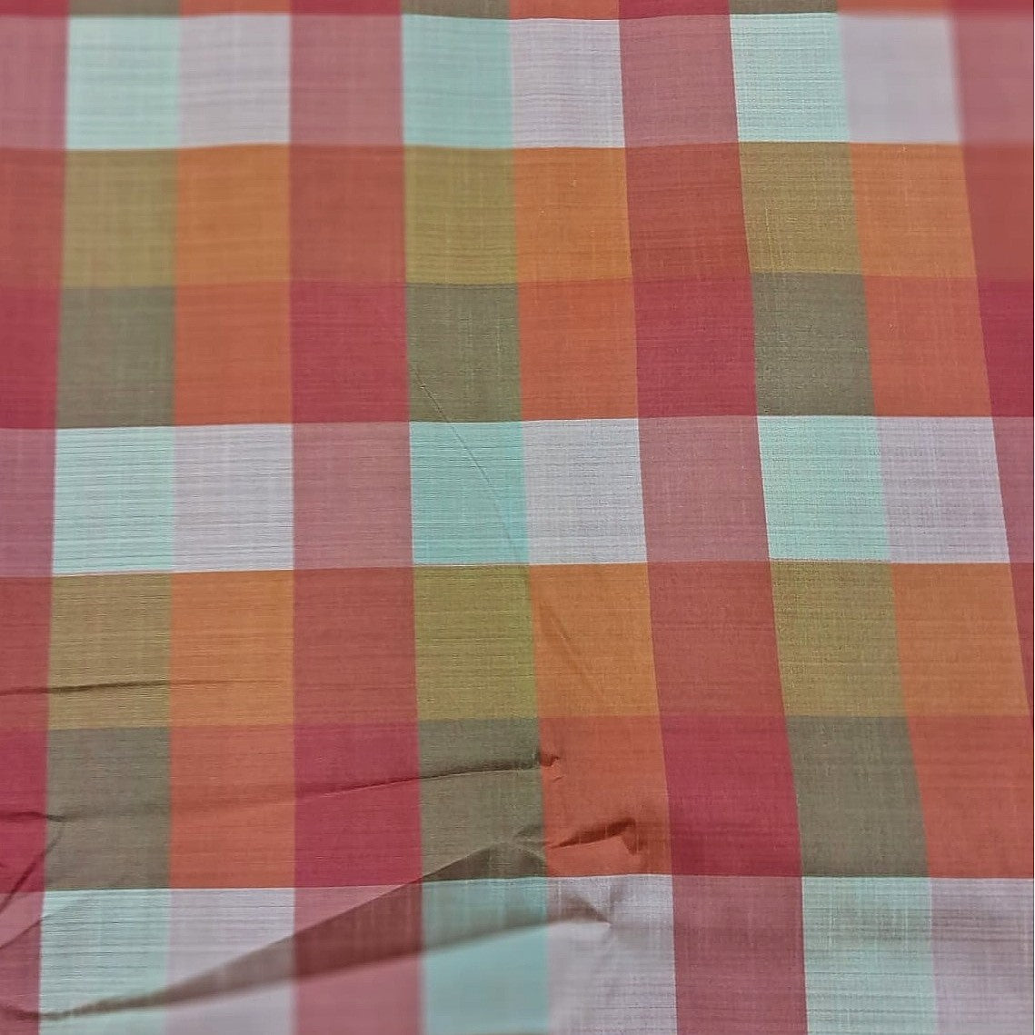 Mehndi Green Checked Raw Silk Fabric, laid flat