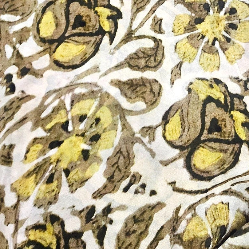 Cream Floral Viscose Georgette Fabric, laid flat