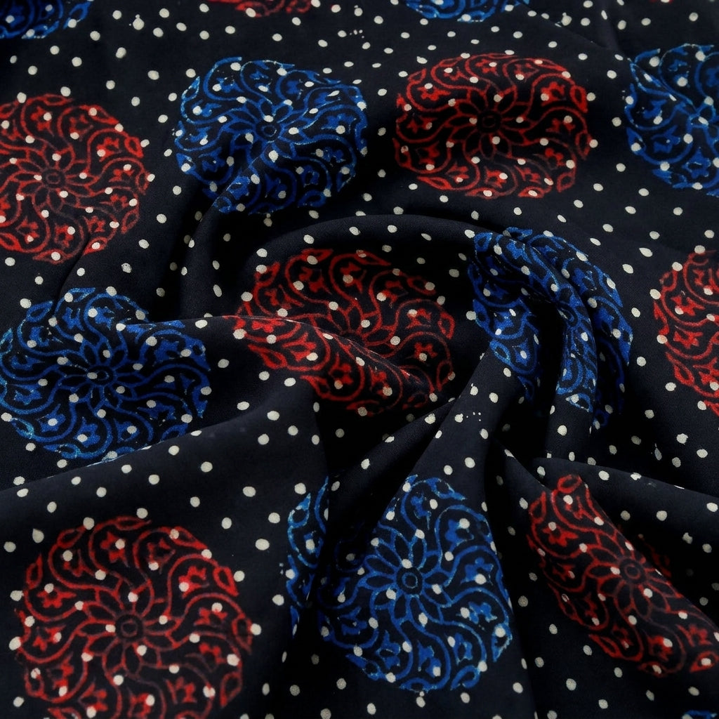 Swirled Black Printed Viscose Georgette Fabric Showing Drape