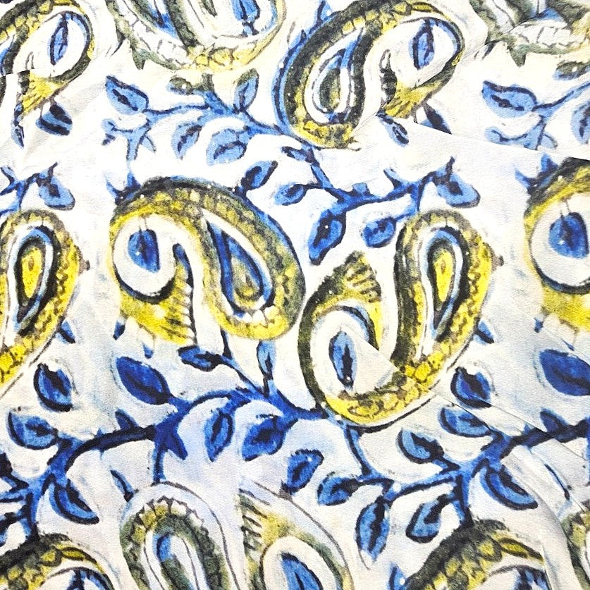 White Paisley Viscose Georgette Fabric, laid flat