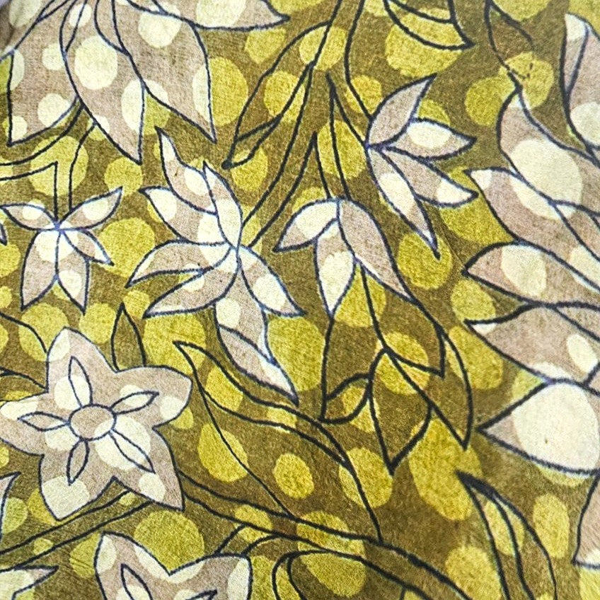 Mustard Yellow Floral Viscose Georgette Fabric, laid flat