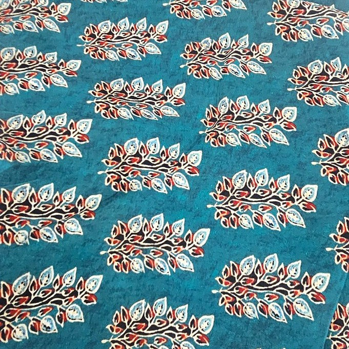 Teal Floral Viscose Georgette Fabric, laid flat