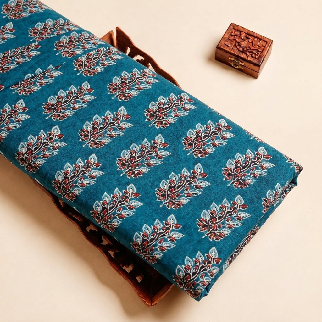 Teal Floral Viscose Georgette Fabric, folded