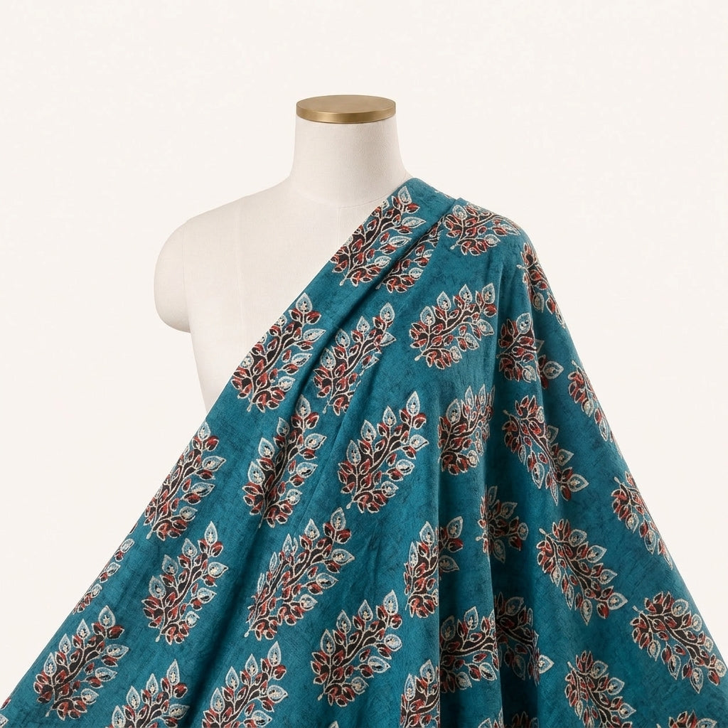 Teal Floral Viscose Georgette Fabric Draped as a saree