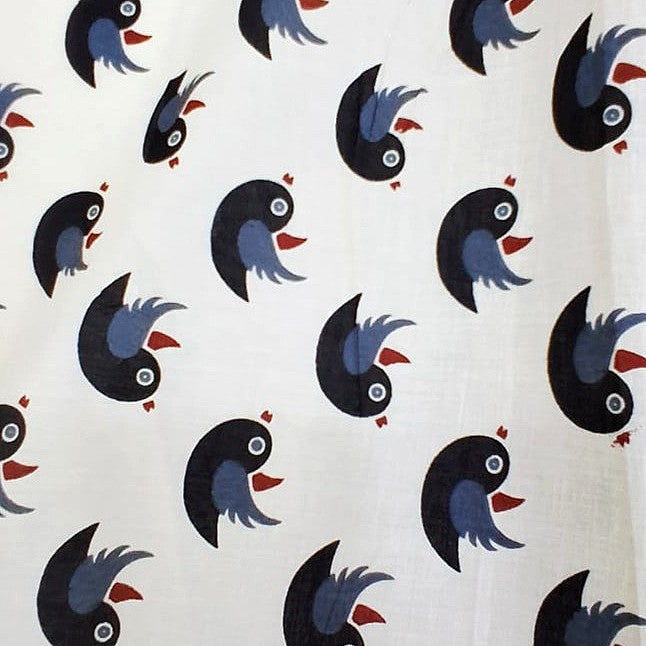 Cream Printed Cotton Fabric, laid flat