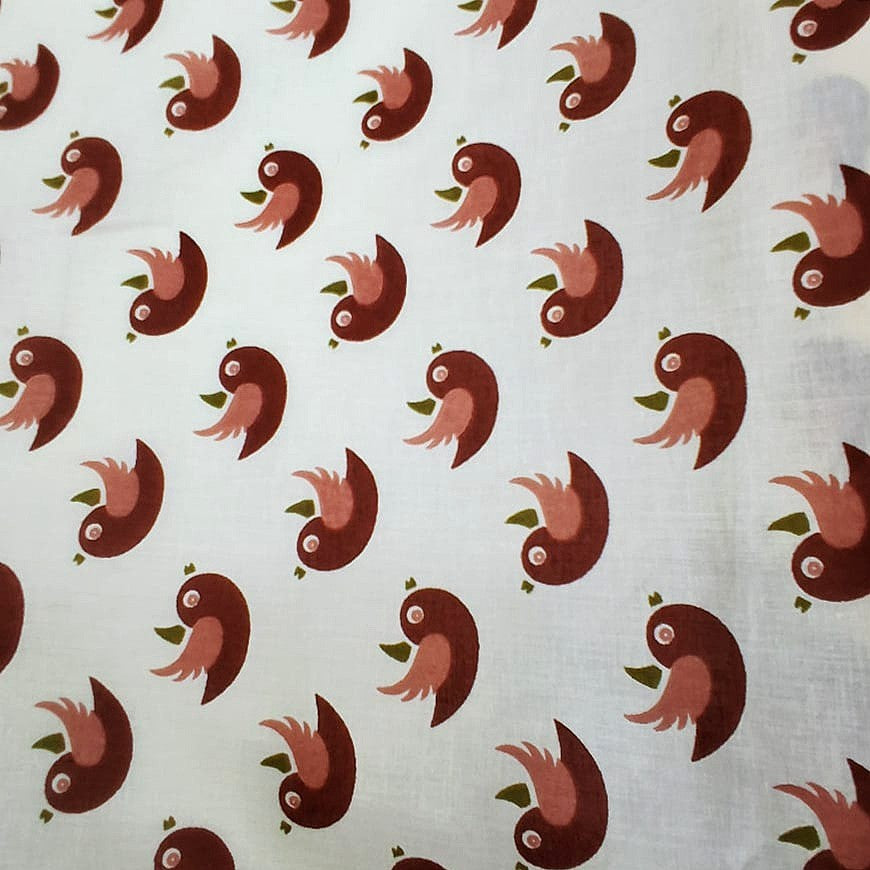 Cream Printed Cotton Fabric, laid flat