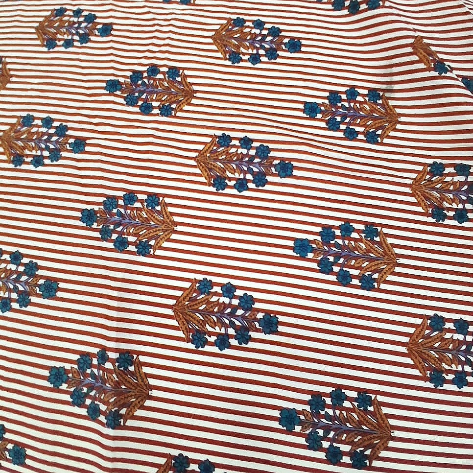 Peach Striped Cotton Fabric, laid flat