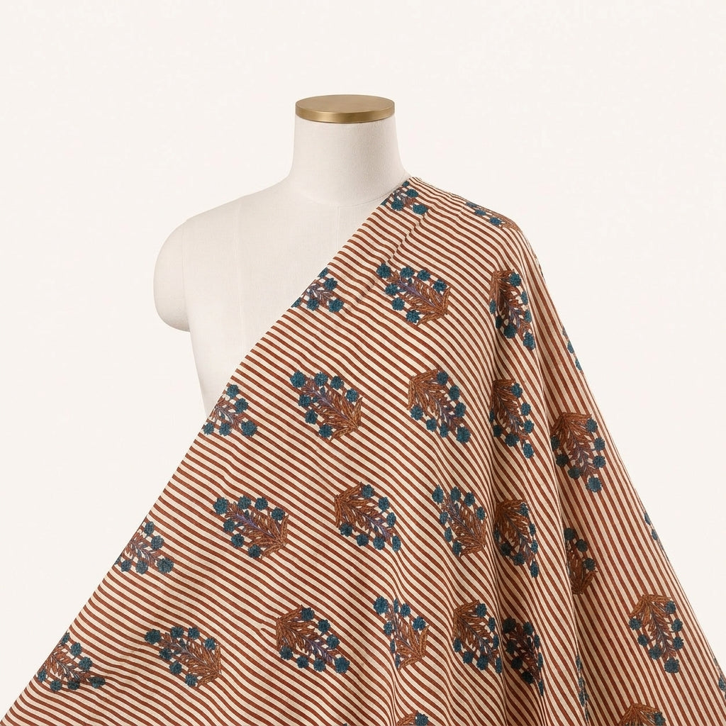 Peach Striped Cotton Fabric Draped as a saree
