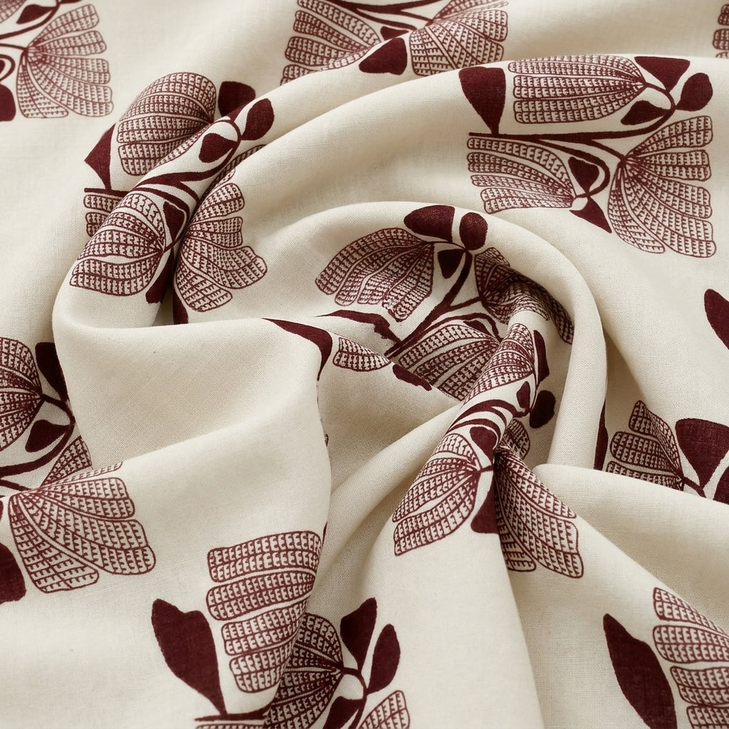 Swirled Cream Floral Cotton Fabric Showing Drape