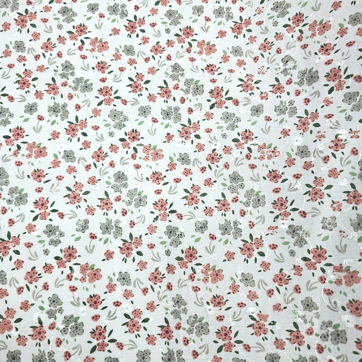 White Embroidery Cotton Fabric, laid flat