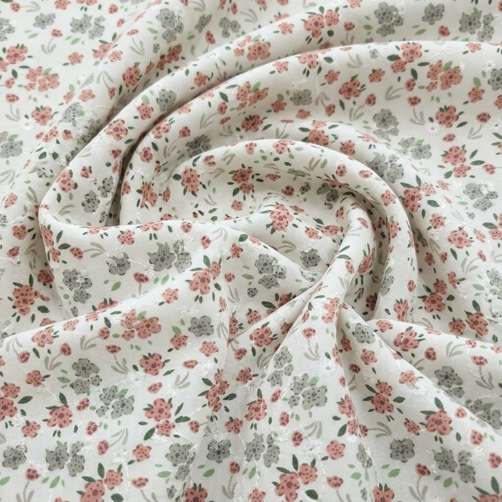 Swirled White Embroidery Cotton Fabric Showing Floral and Drape