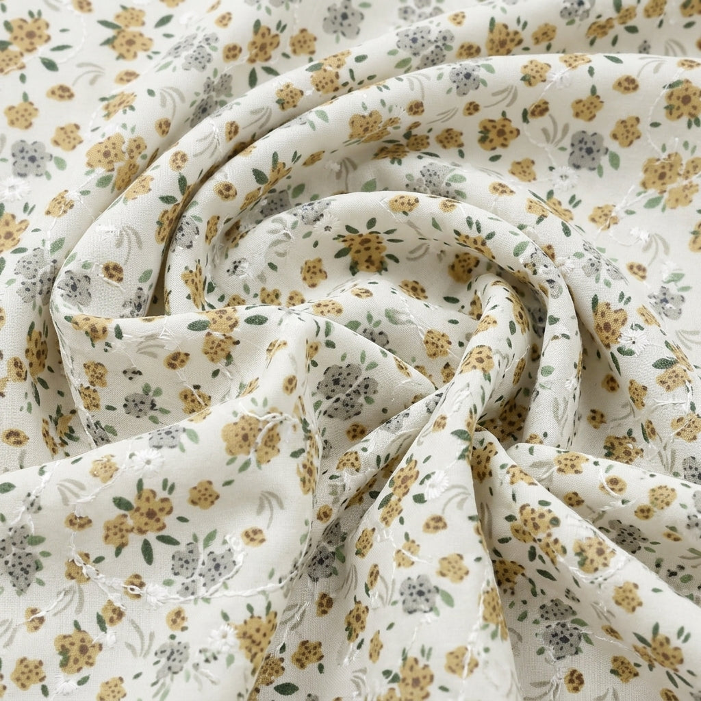 Swirled White Embroidery Cotton Fabric Showing Floral and Drape