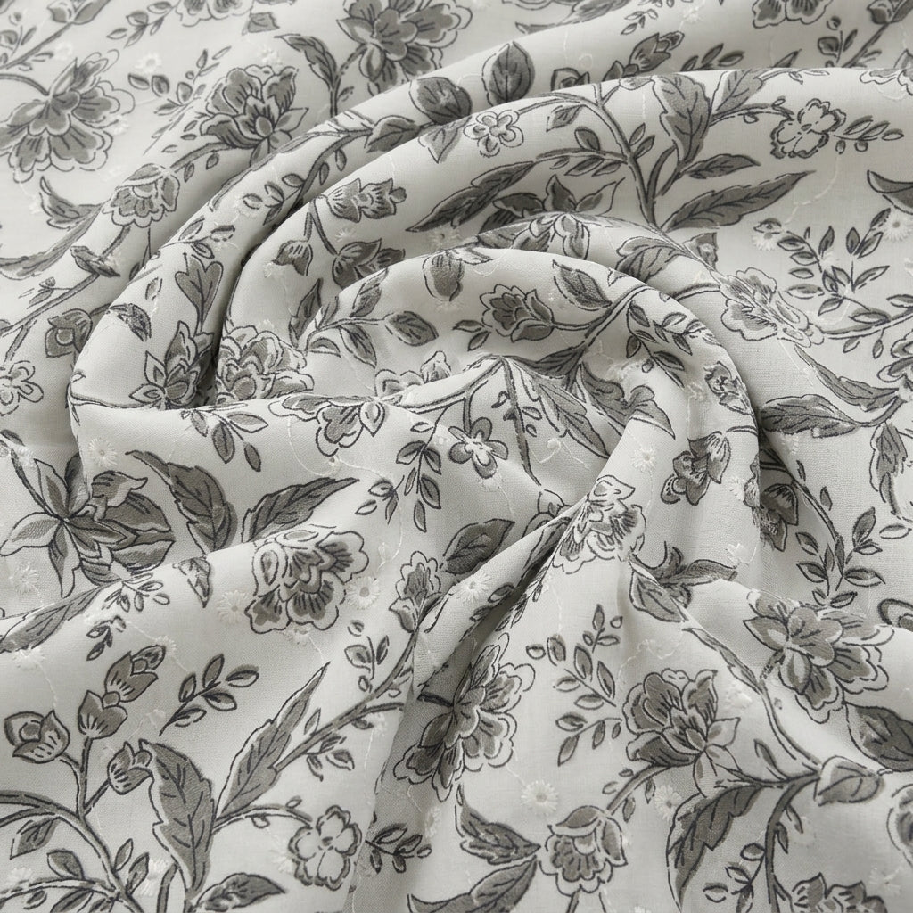 Swirled White Embroidery Cotton Fabric Showing Floral and Drape