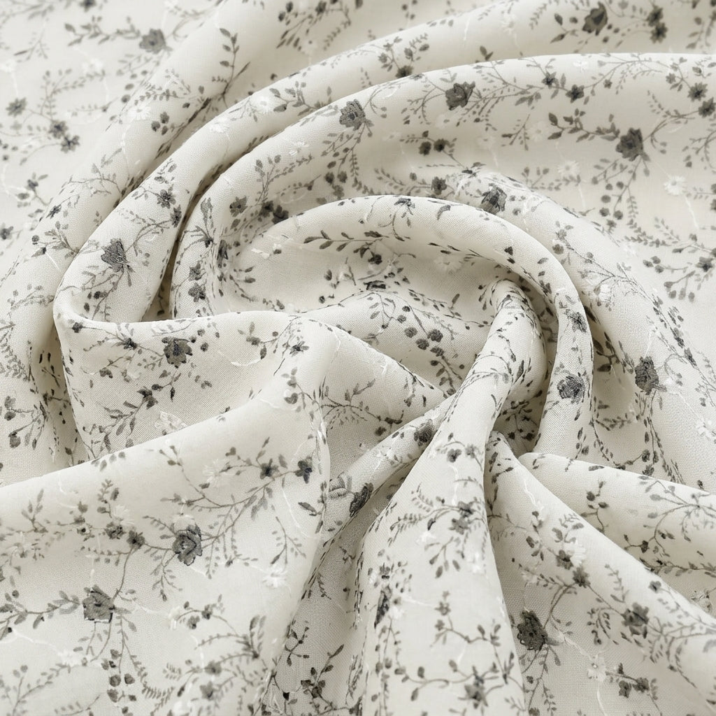 Swirled White Embroidery Cotton Fabric Showing Floral and Drape