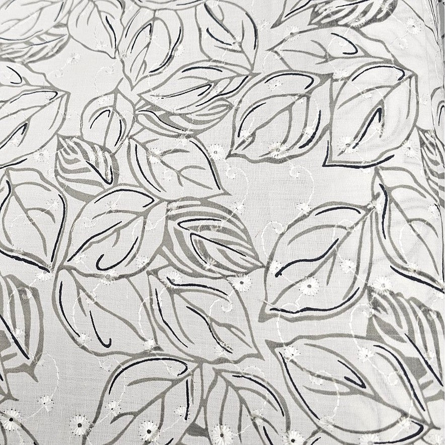 White Embroidery Cotton Fabric, laid flat