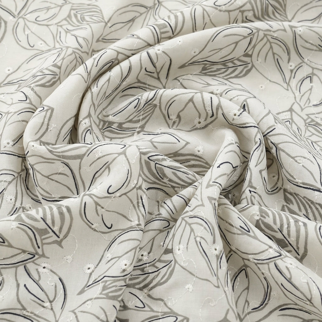 Swirled White Embroidery Cotton Fabric Showing Leaf and Drape
