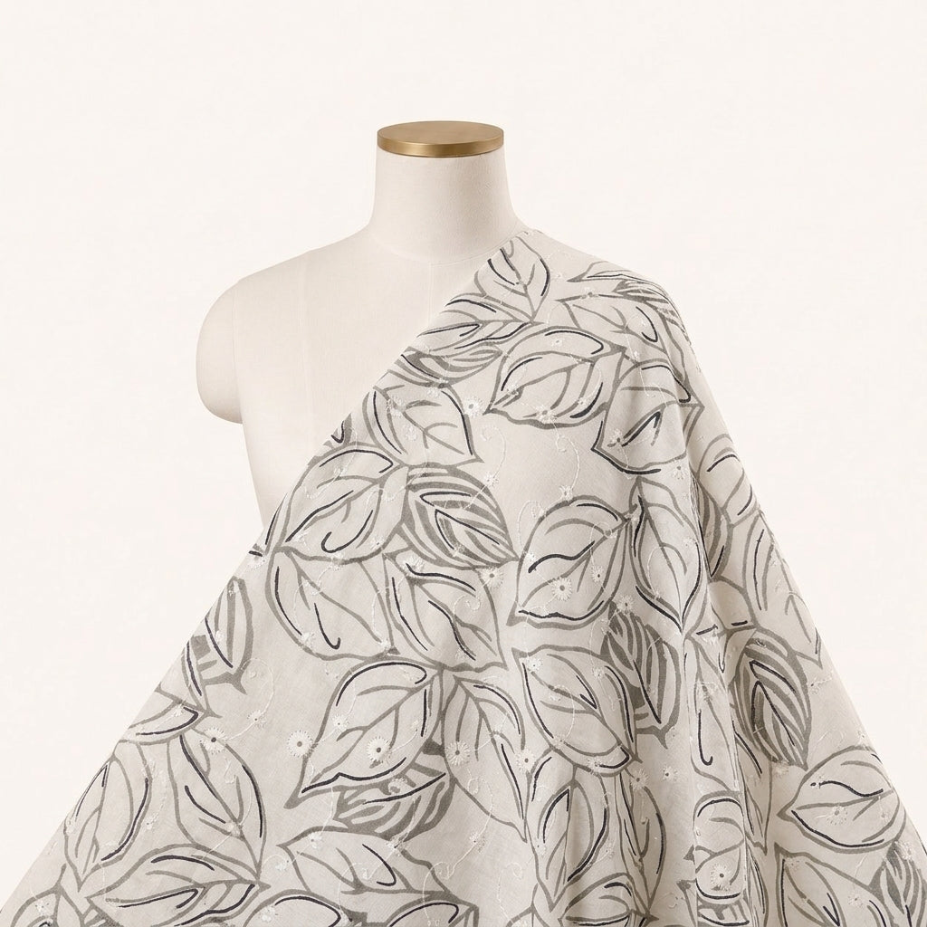 White Embroidery Cotton Fabric Draped as a saree
