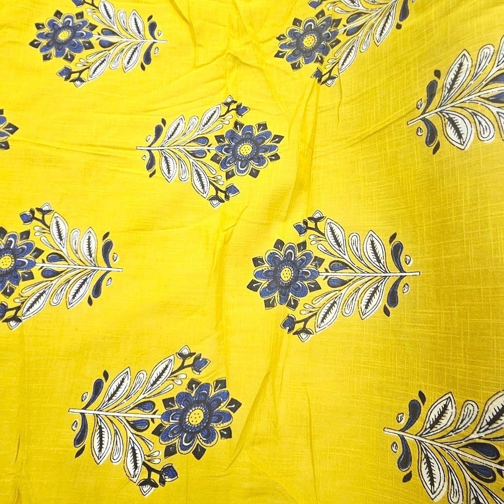 Yellow Floral Cotton Fabric, laid flat