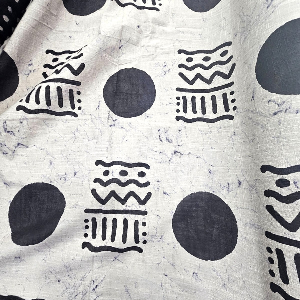 Cream Abstract Cotton Fabric, laid flat
