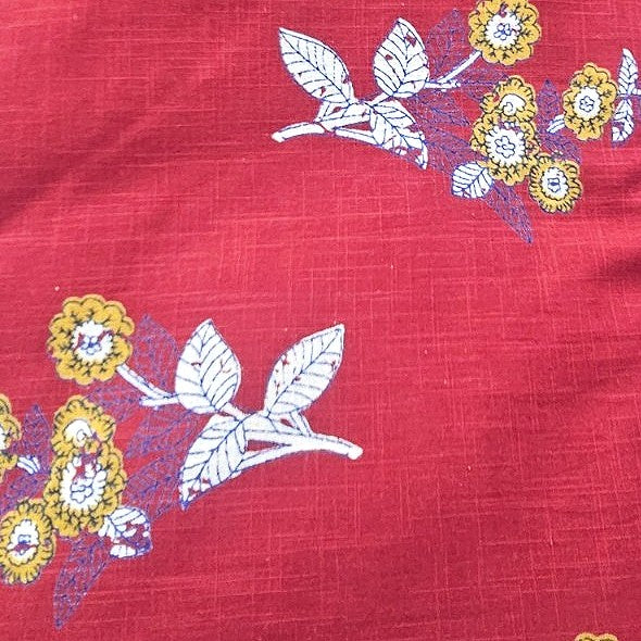 Red Floral Cotton Fabric, laid flat
