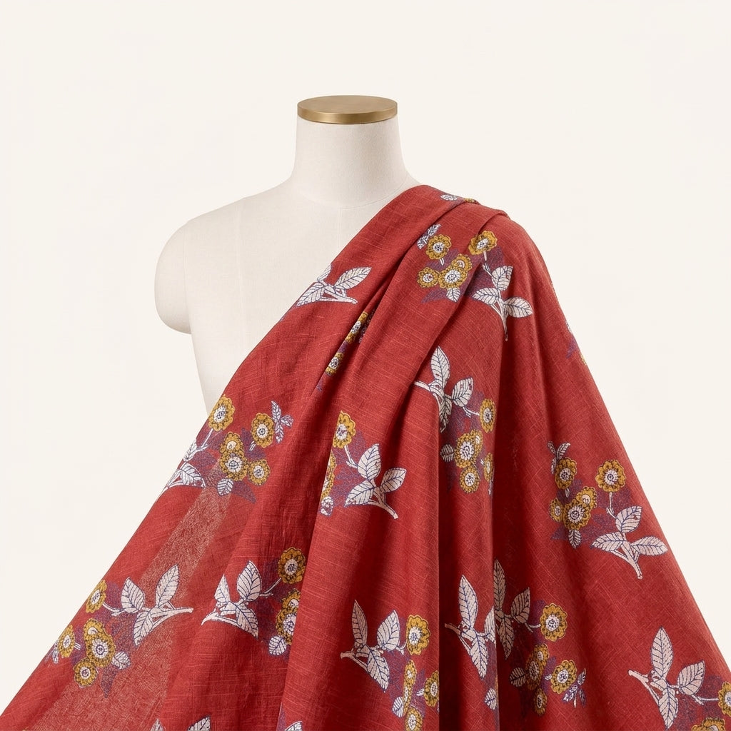 Red Floral Cotton Fabric Draped as a saree