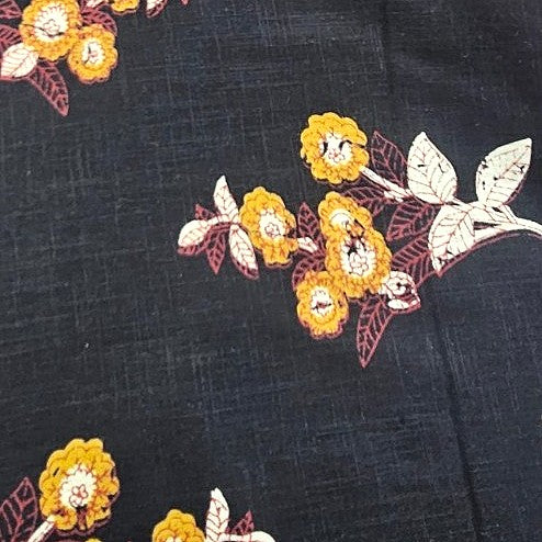 Black Floral Cotton Fabric, laid flat